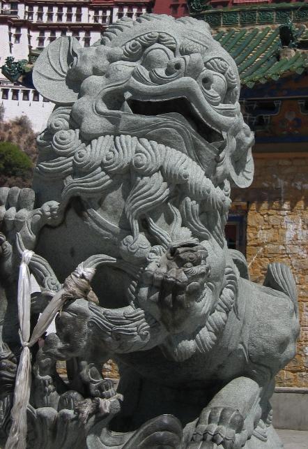 Snow Lions protect the entrance to the Potala Pallace